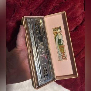 Vintage Echo Harmonica with Silver and Gold Accents